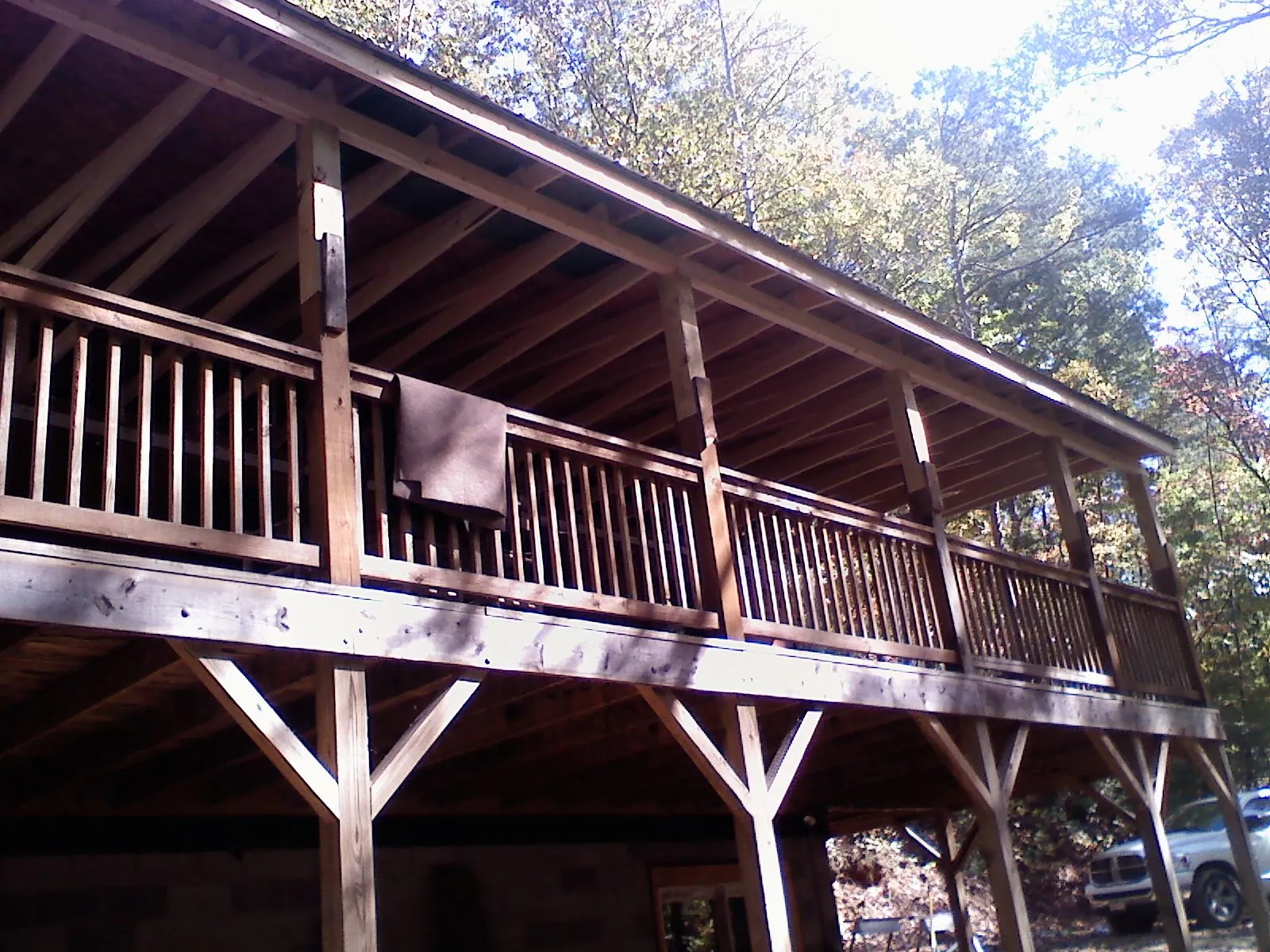 Timber framing under a new elevated porch and deck — Roof Leak Repair in West Concord by Roofing Brothers